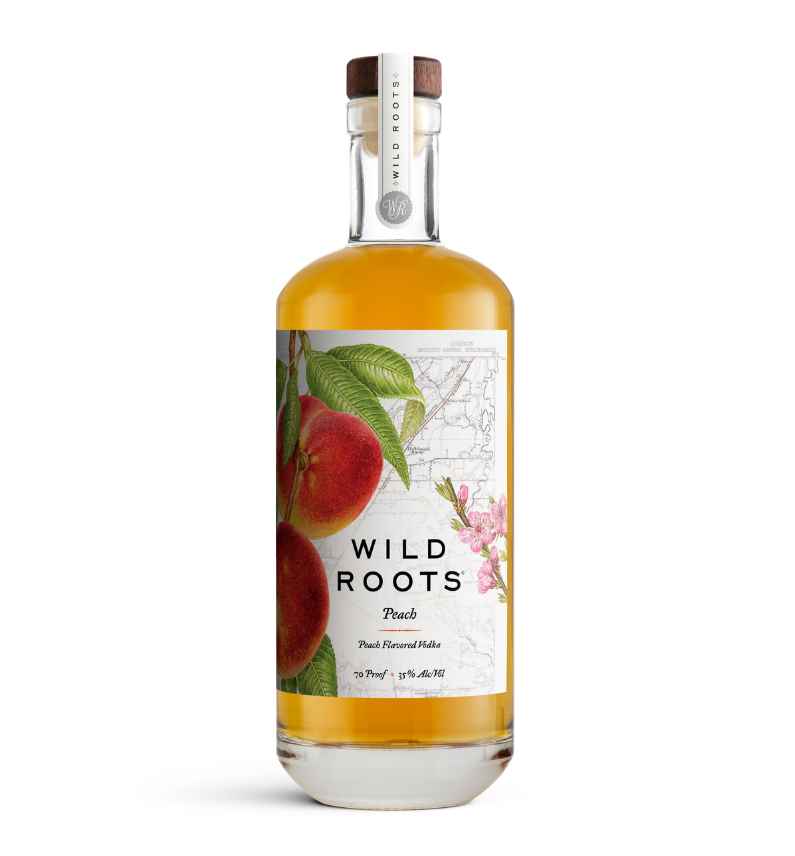 Bottle of Wild Roots Peach vodka on a white background