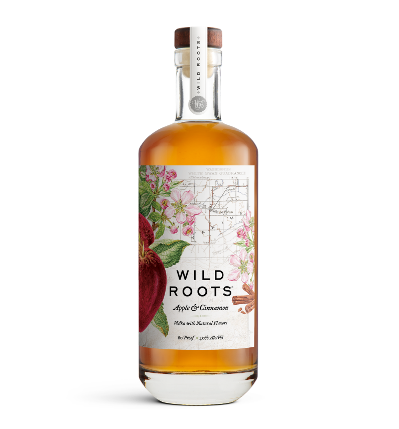 Bottle of Wild Roots Apple & Cinnamon Vodka on a white background