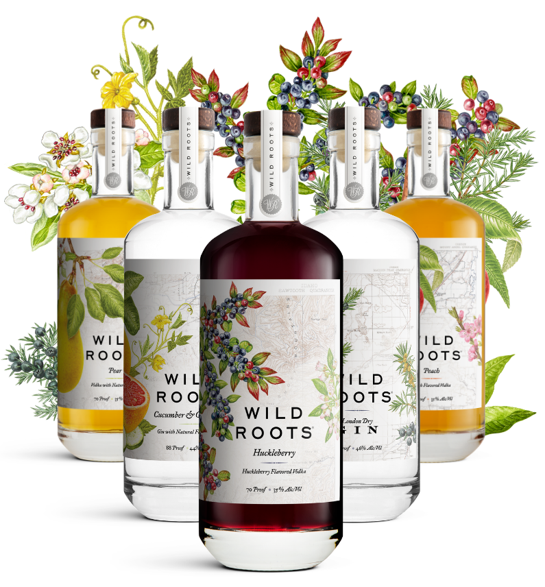 Five bottles of Wild Roots gin and vodka with floral and botanical designs on their labels against a white background.