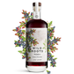 Bottle of Wild Roots Huckleberry vodka with a decorative arrangement of berries on a white background