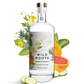 Bottle of Wild Roots cucumber and grapefruit gin with botanicals and fruits on a white background
