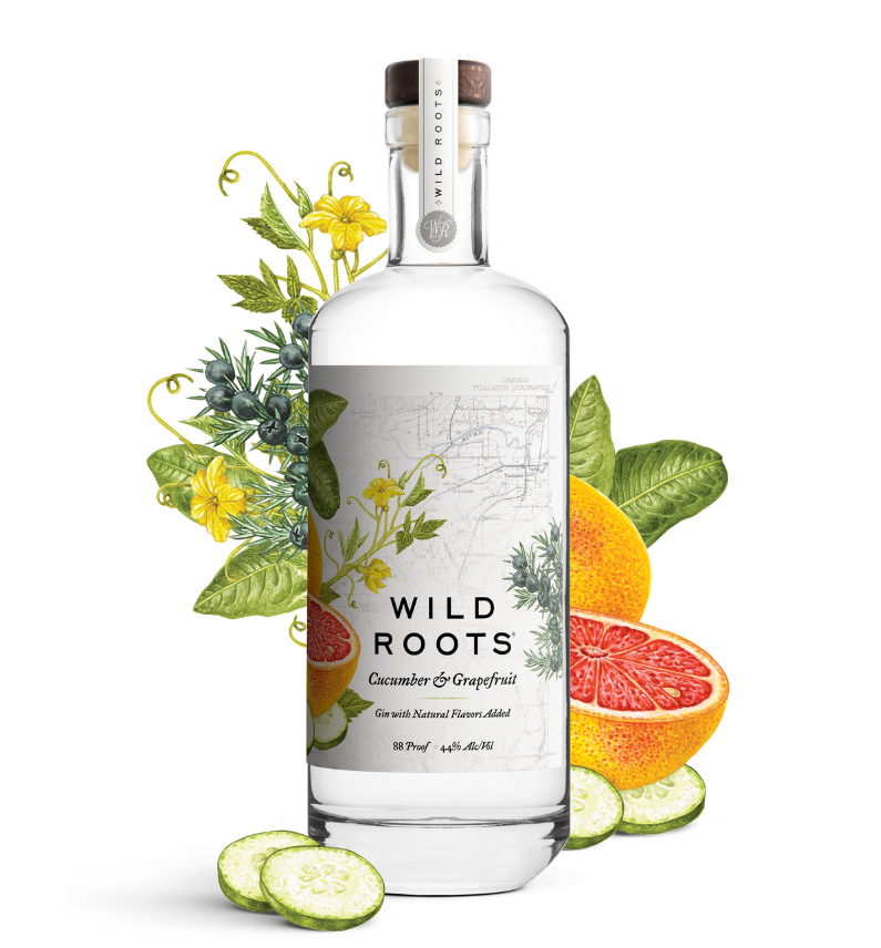 Bottle of Wild Roots cucumber and grapefruit gin with botanicals and fruits on a white background